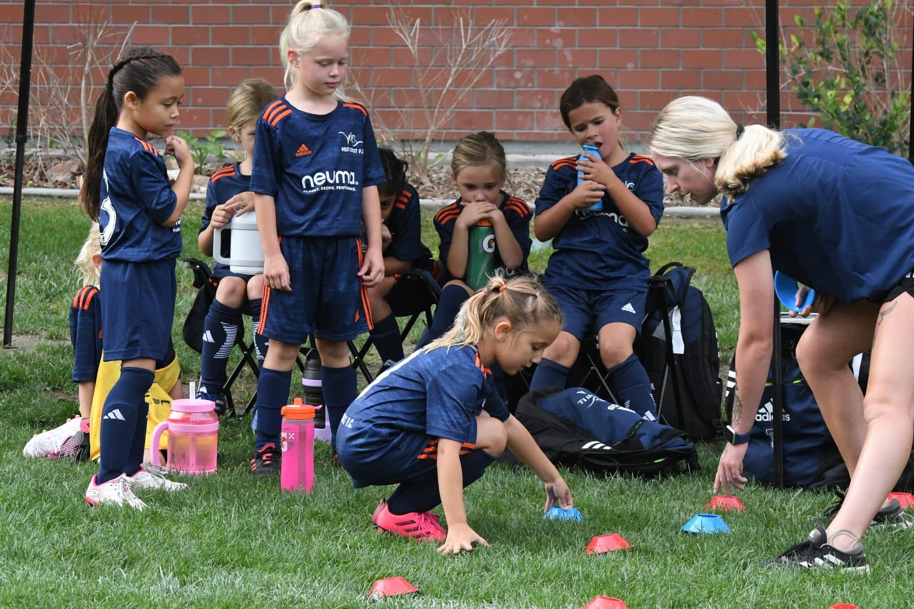 Coach Bella coaching a youth training session