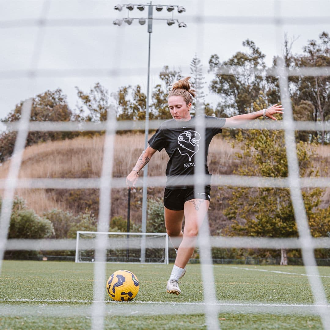 Close dribbling through cones in a skills session
